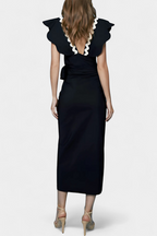Fabiana Conjunto Elegante con Volantes y Costuras en Contraste