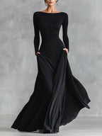 Vestido maxi elegante con pliegues fluidos