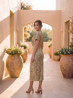 Calandra™ | Vestido midi efecto estilizador con nudo central y caída fluida