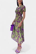 Elara Vestido Maxi con Nudo Frontal y Estampado Floral Delicado