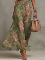 Serena ∙ Vestido largo verde floral en chiffon con escote halter
